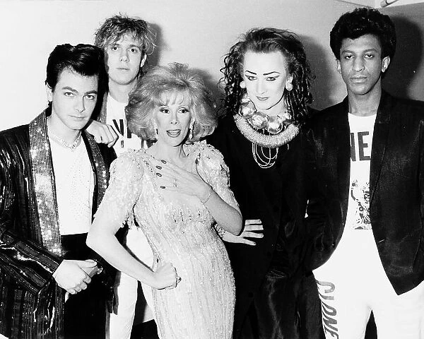 Singer Boy George with his group Culture Club and Joan Rivers