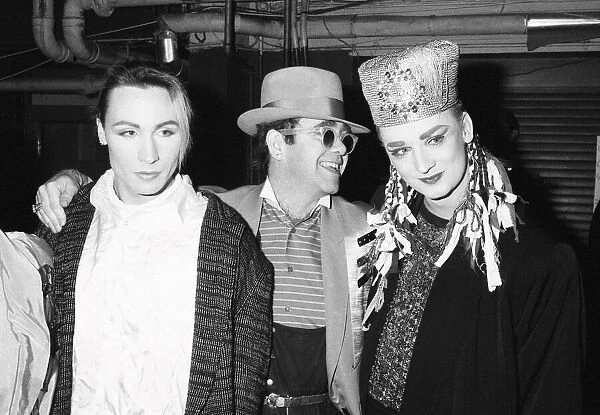 Singer Boy George with with friend Marilyn and Elton John during the Culture Club