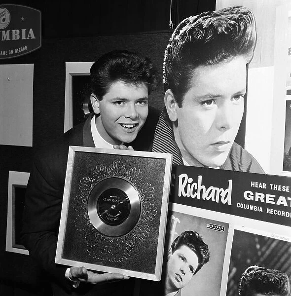 Singer Cliff Richard with his Silver Disc award for the single 'I Love You