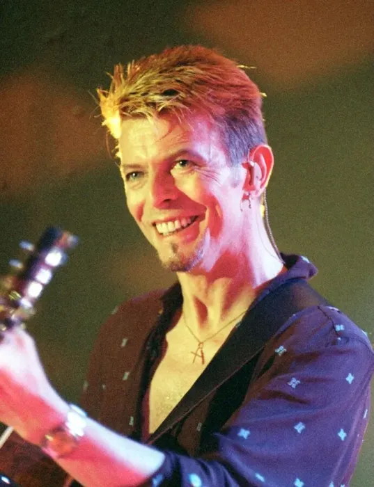 Framed Print : Singer David Bowie July 1997 Playing the guitar live on stage at the Glasgow Barrowlands