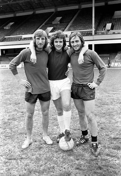 Singer David Essex pictured at Upton Park with footballers Billy Bonds