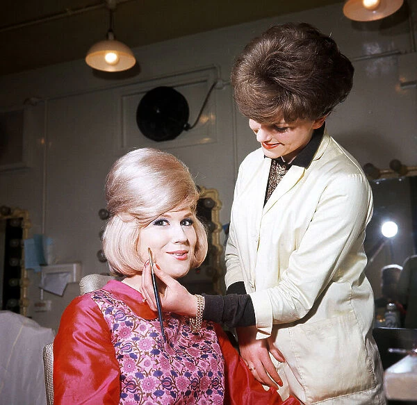 Singer Dusty Springfield being made up by Hilary Bates for '