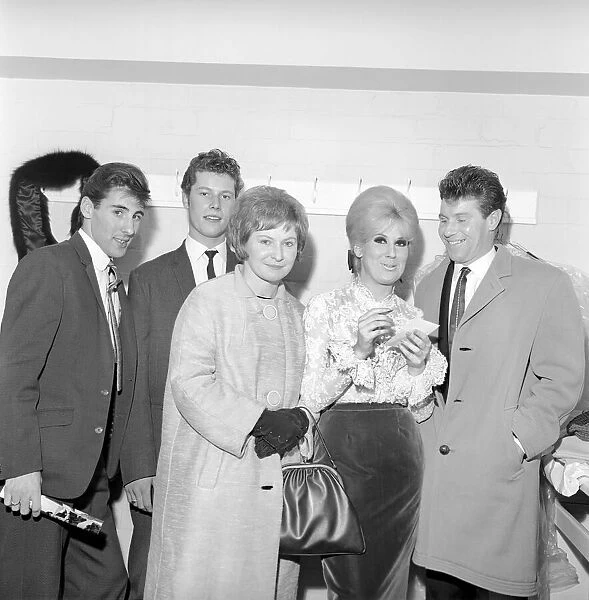 Singer Dusty Springfield seen here signing autographs. Circa 1962