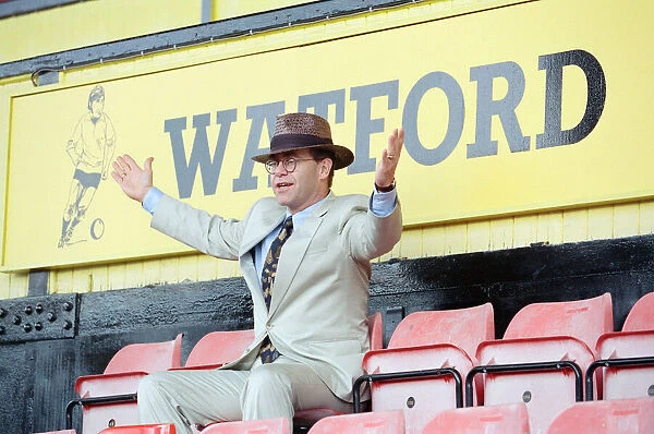 Singer Elton John is back at Watford promising to do what he can to lift the Second