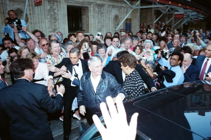 Framed Print : Singer Frank Sinarta is mobbed by waiting fans as he arrives at the Royal Albert Hall to Framed Print : Singer Frank Sinarta is mobbed by waiting fans as he arrives at the Royal Albert Hall to