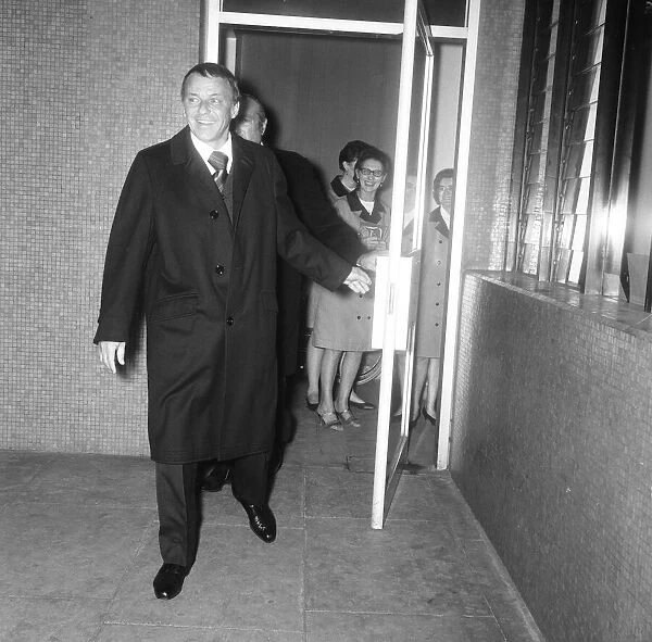 Singer Frank Sinatra pictured as he left the Festival Hall