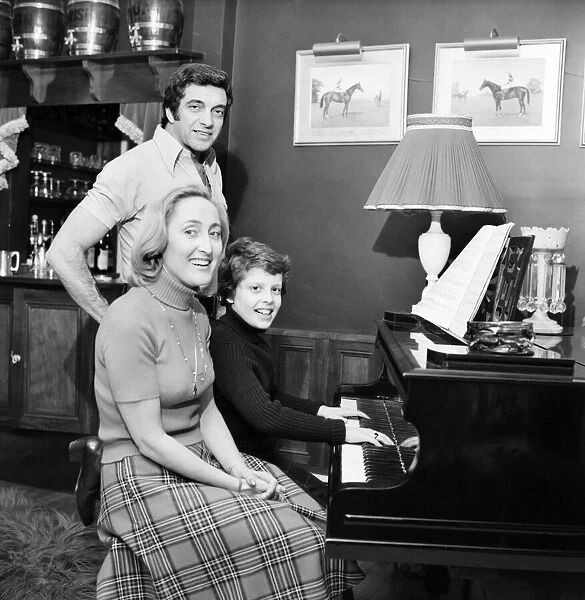 Singer Frankie Vaughan and family. February 1975 75-01098-005