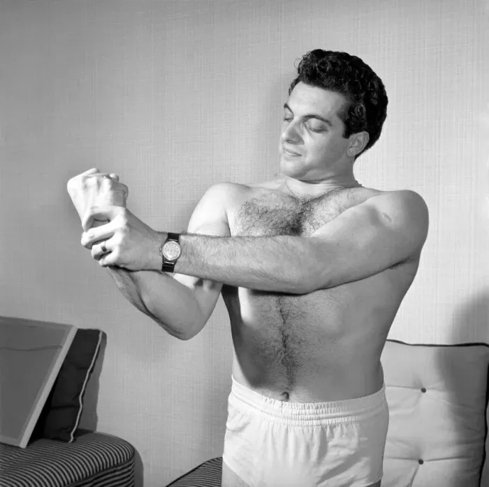 Framed Print : Singer Frankie Vaughan seen here exercising at home. Circa 1957