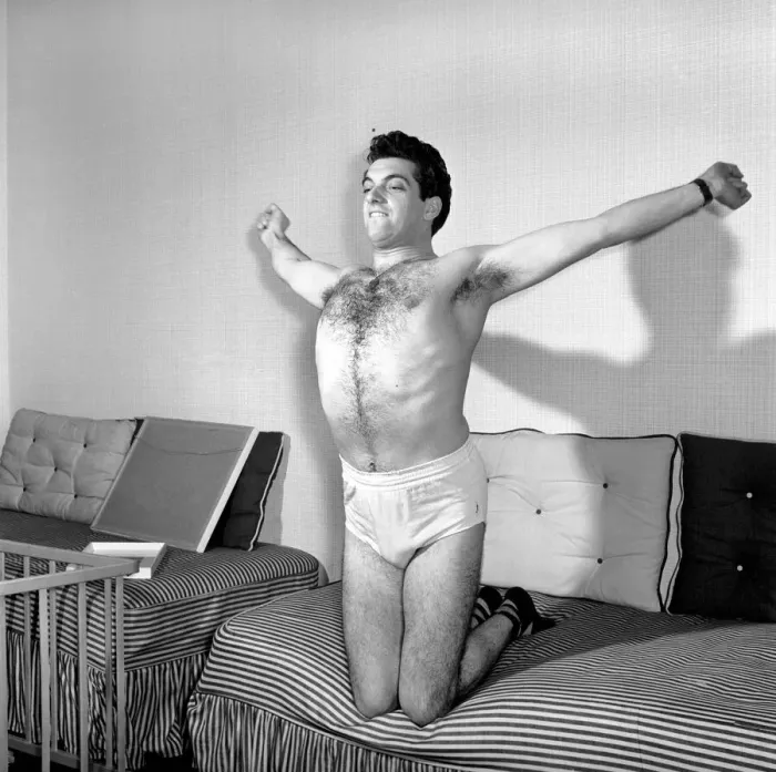 Framed Print : Singer Frankie Vaughan seen here exercising at home. Circa 1957