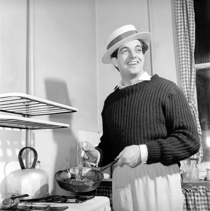 Framed Print : Singer Frankie Vaughan seen here at home cooking breakfast for his family. Circa 1957 Framed Print : Singer Frankie Vaughan seen here at home cooking breakfast for his family. Circa 1957