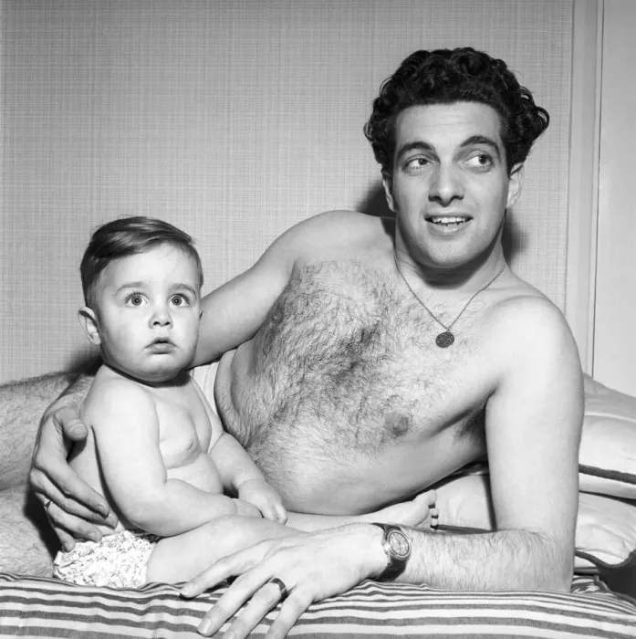 Framed Print : Singer Frankie Vaughan seen here playing with his son David. Circa 1957