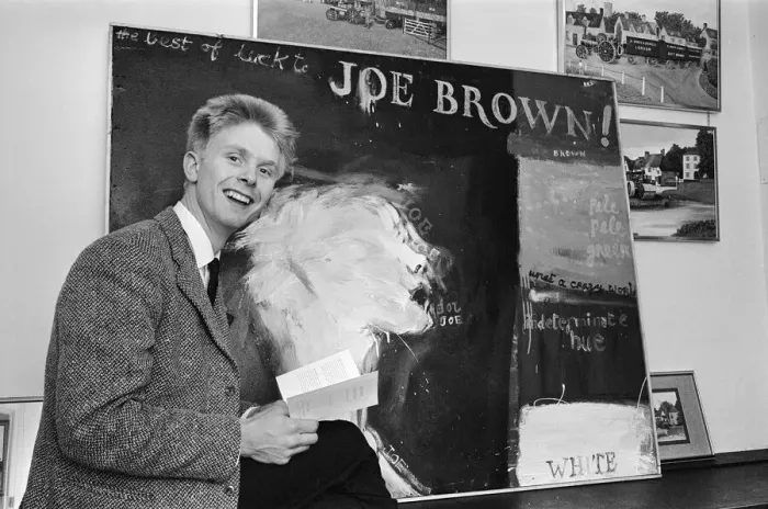 Framed Print : Singer Joe Brown collects a picture of himself from Portal Gallery, Grafton Street, W1 Framed Print : Singer Joe Brown collects a picture of himself from Portal Gallery, Grafton Street, W1