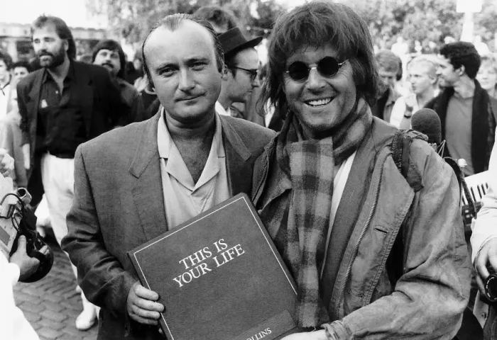 Framed Print : Singer Phil Collins is surprised by This Is Your Life presenter Michael Aspell Framed Print : Singer Phil Collins is surprised by This Is Your Life presenter Michael Aspell