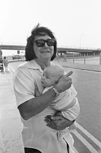 Singer Roy Orbison, pictured at Manchester Ringway Airport in 1975