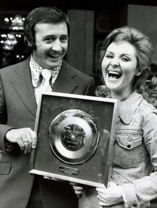 Framed Print : Singer Tony Christie with pop singer Lulu wins award for a million sales of his hit Is