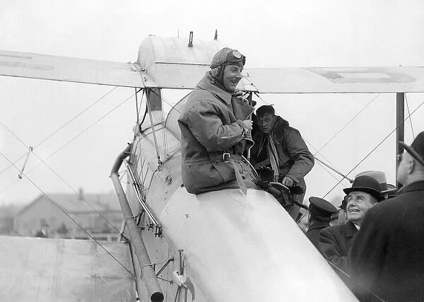 Sir Alan Cobham climbing out of a De Havilland D. H. 50 at Croydon Airport on 17th March