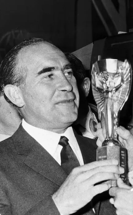 Framed Print : Sir Alf Ramsey England manager, Wearing suit and Tie holding world cup trophy Framed Print : Sir Alf Ramsey England manager, Wearing suit and Tie holding world cup trophy