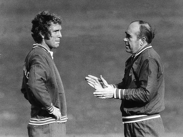 Sir Alf Ramsey talks tactics to Bobby Moore during England training session at BAC ground
