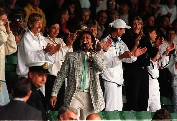 Sir Cliff Richard sings for spectators as rain suspends play on Wimbledon