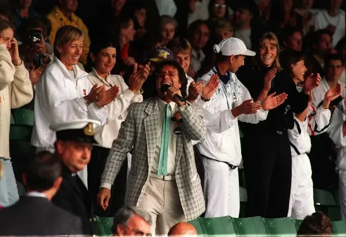 Framed Print : Sir Cliff Richard sings for spectators as rain suspends play on Wimbledon Framed Print : Sir Cliff Richard sings for spectators as rain suspends play on Wimbledon