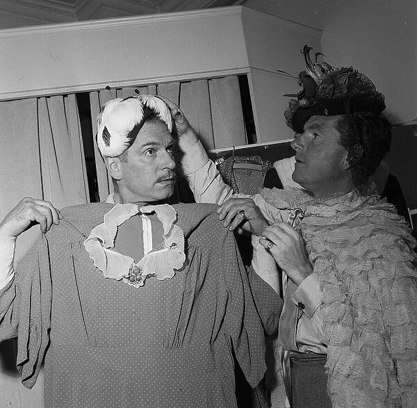 Sir Laurence Olivier and Kenneth More dressing up for their act in '
