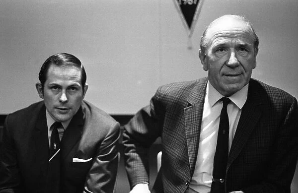 Sir Matt Busby, announces that Wilf McGuinness, Manchester United Assistant Trainer