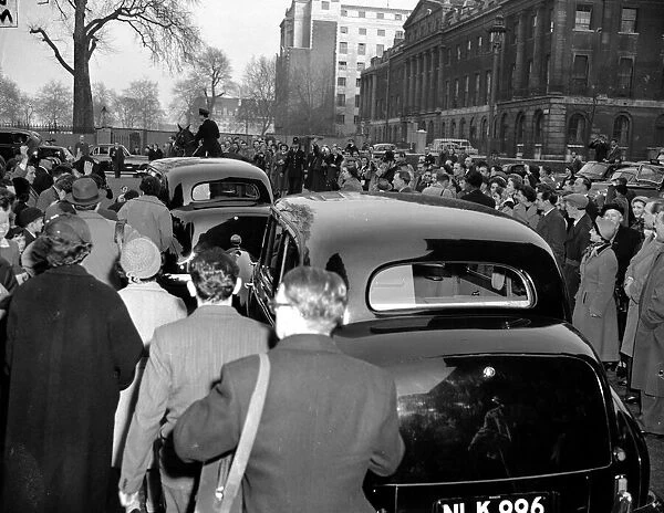 Sir Winston Churchill - April 1955, people gather as the cars go by