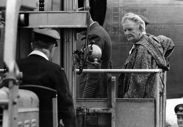 Sir Winston Churchill arrives at London Airport. Lady Churchill photographed aboard
