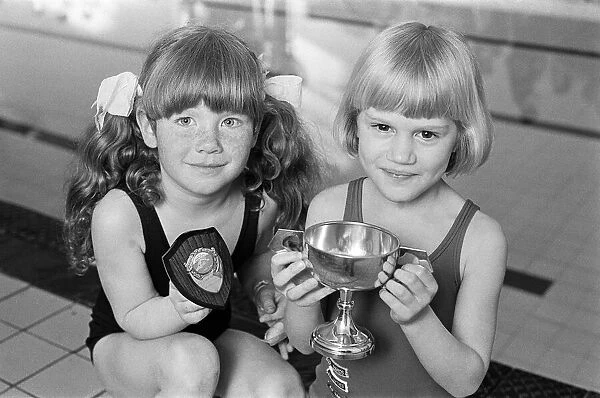 Six-year-old swimmer Charlotte Ann St Clair (right) is the '