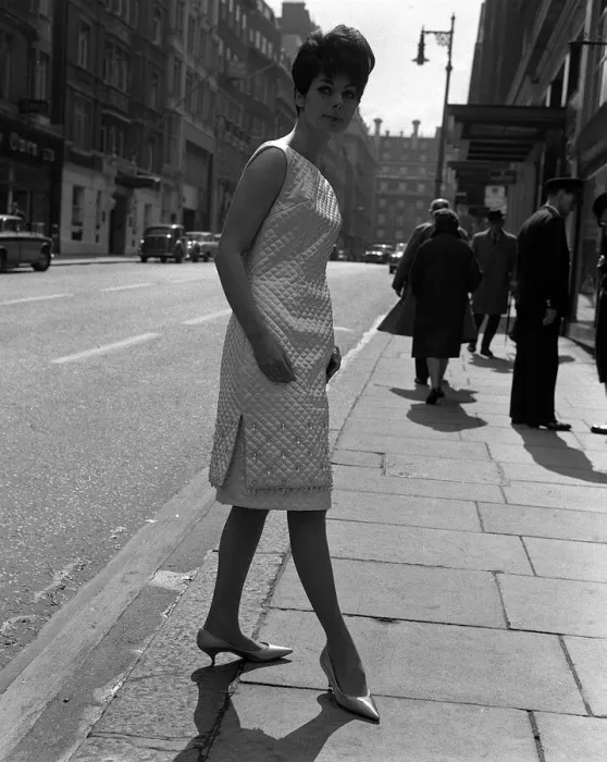 Framed Print : Sixties Fashion by Kiki Byrne Model wearing white dress with slits to the thigh Framed Print : Sixties Fashion by Kiki Byrne Model wearing white dress with slits to the thigh