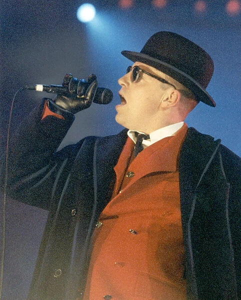 Ska group Madness performing at GMex in Manchester. Pictured is lead singer Suggs