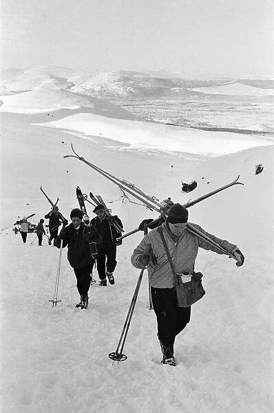Skiers in the Cairngorms, a mountain range in the eastern Highlands of Scotland