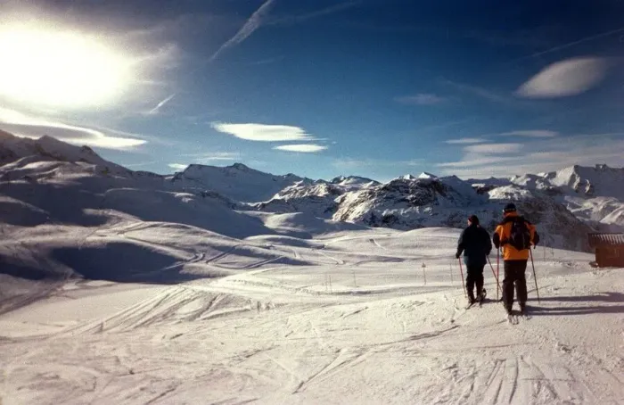 Framed Print : Skiers overlook the French Alps at Val D Isere February 1999