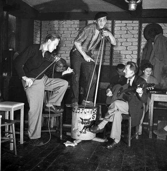 Skiffle group belived to be called the Black Cat seen here performing in a pub