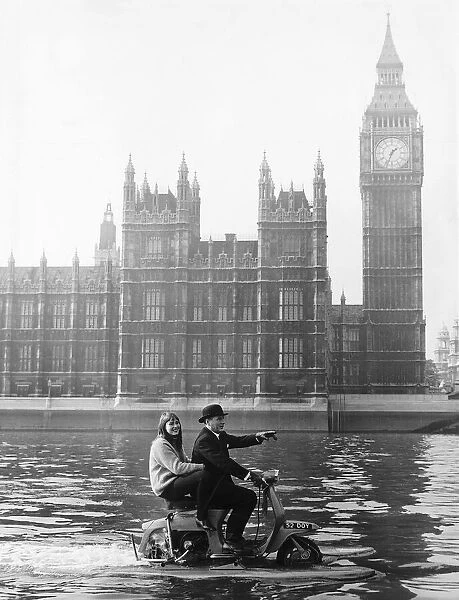 Skipper and stella Hornsby sail up the Thames on their scooter at a fair rate of knots