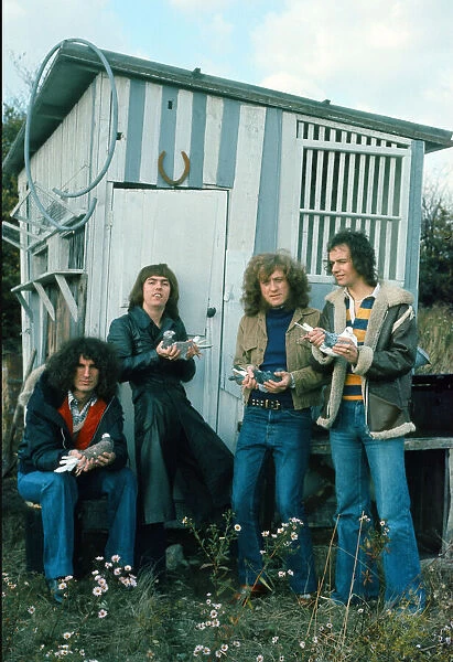 Slade band members Don Powell, Dave Hill, Jim Lea and Noddy Holder on the set of their
