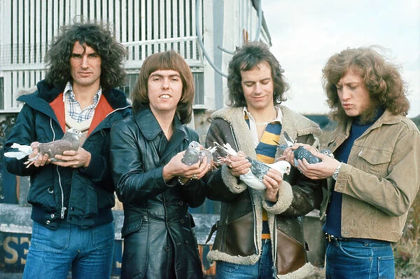 Slade band members Don Powell, Dave Hill, Jim Lea and Noddy Holder on the set of their