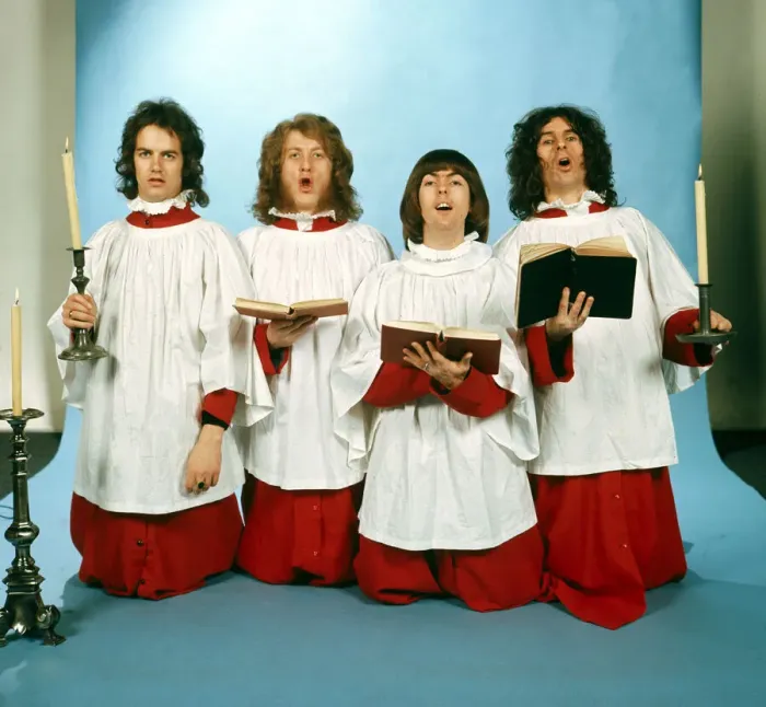 Framed Print : Slade dressed in choir boy outfits Christmas setting with candles