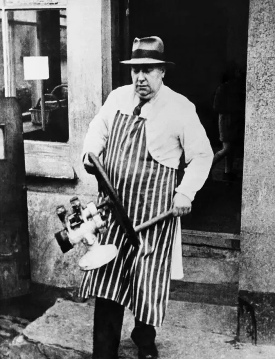 Framed Print : Slapton butcher moving the contents of his shop prior to completion of the evacuation of Framed Print : Slapton butcher moving the contents of his shop prior to completion of the evacuation of