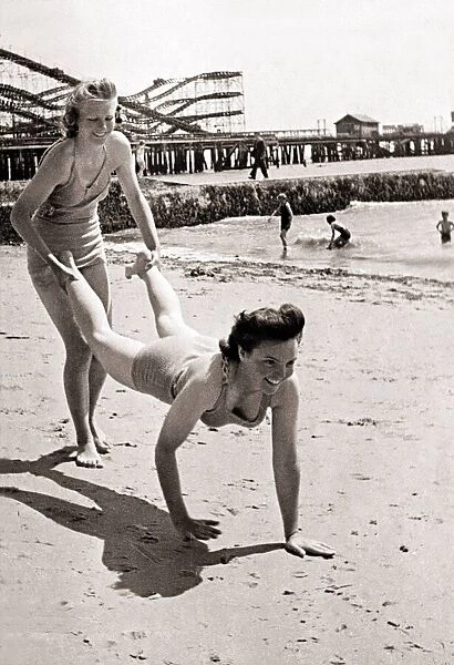 Slimming exercises on the sands at Clacton on sea beach July 1946