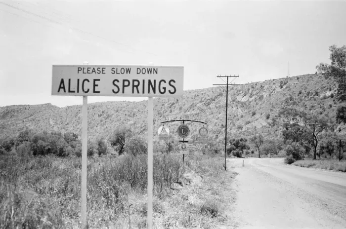 Framed Print : Slow down sign at the entrance to the town of Alice Springs, Australia. 1st February 1976 Framed Print : Slow down sign at the entrance to the town of Alice Springs, Australia. 1st February 1976