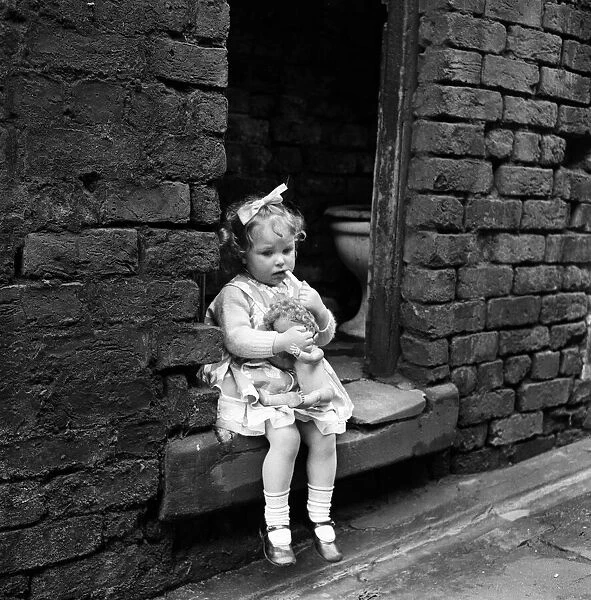 Slum housing in Everton, Liverpool. Diane McCardle is two and a half years old