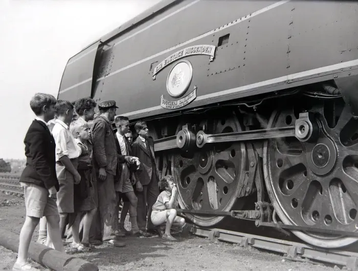 Framed Print : Small boys admire the Battle of Britain class steam locomotive during an open day