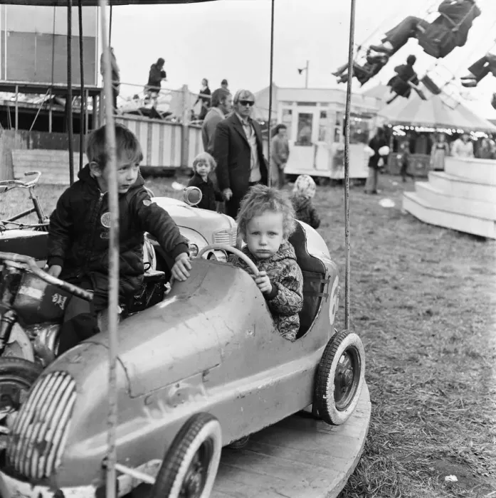 Framed Print : A small child enjoying the thrill of the merry-go-round at Silcocks Fair at Skelmersdale Framed Print : A small child enjoying the thrill of the merry-go-round at Silcocks Fair at Skelmersdale