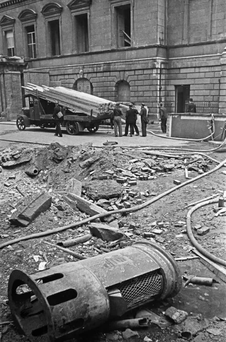 Framed Print : A small crater outside The Mansion House in the City of London which was damaged by Framed Print : A small crater outside The Mansion House in the City of London which was damaged by