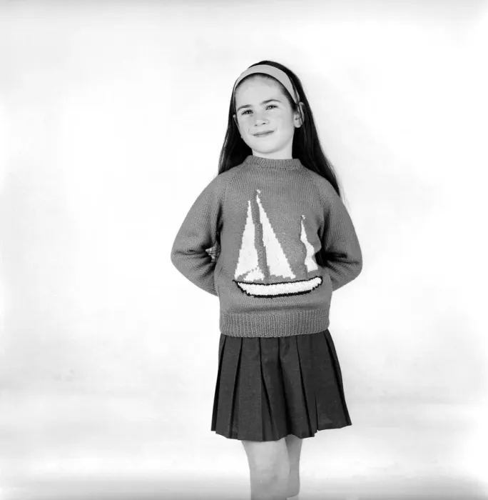 Framed Print : Small girl wearing Chichester sweaters in celebration of Sir Francis Chichester round Framed Print : Small girl wearing Chichester sweaters in celebration of Sir Francis Chichester round