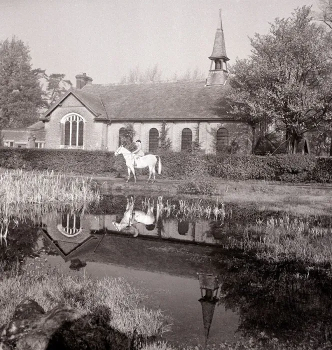 Framed Print : A small Methodist village church in Mill Hill Village London where a lady is out riding Framed Print : A small Methodist village church in Mill Hill Village London where a lady is out riding