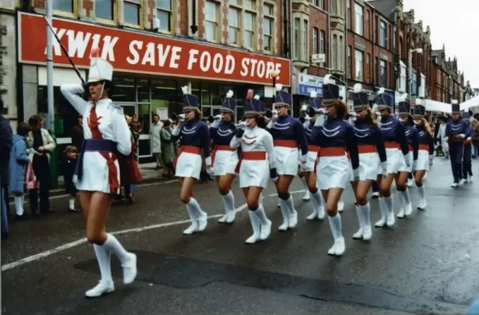 Framed Print : A smartly dressed marching band heads a parade along Station Road, Port Talbot, 1982 Framed Print : A smartly dressed marching band heads a parade along Station Road, Port Talbot, 1982