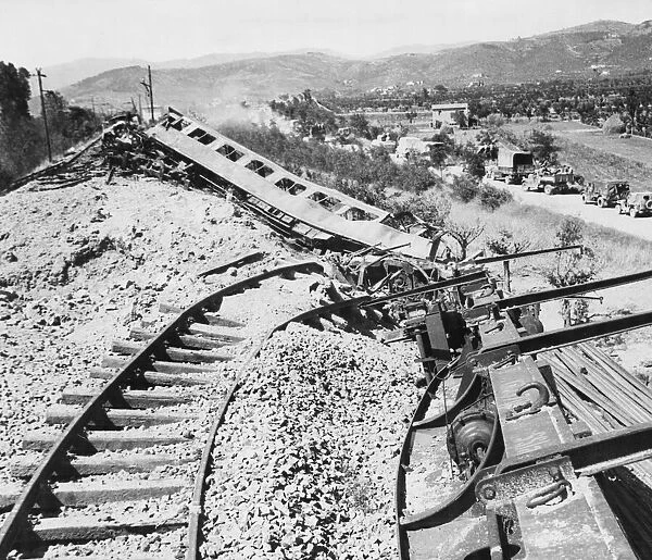 Smashed rolling stock in Florence which was bombed by the Allied attack