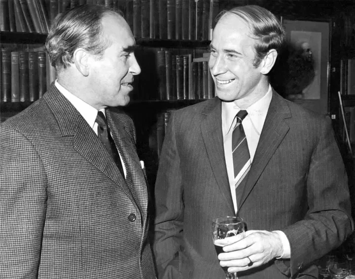 Framed Print : A smiling Bobby Charlton talking to England team manager Sir Alf Ramsey (left Framed Print : A smiling Bobby Charlton talking to England team manager Sir Alf Ramsey (left
